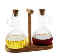 Glass oil bottle with metal stand